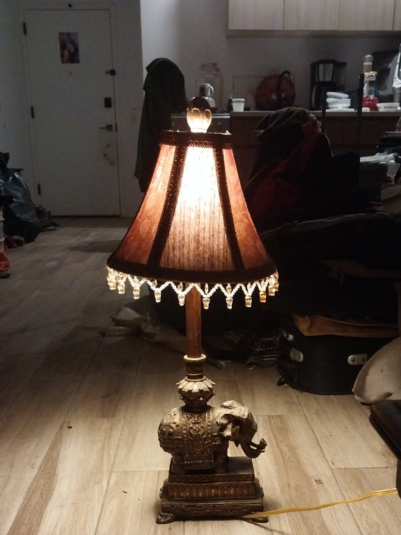 Bronze elephant table lamp with fabric shade and beaded trim
