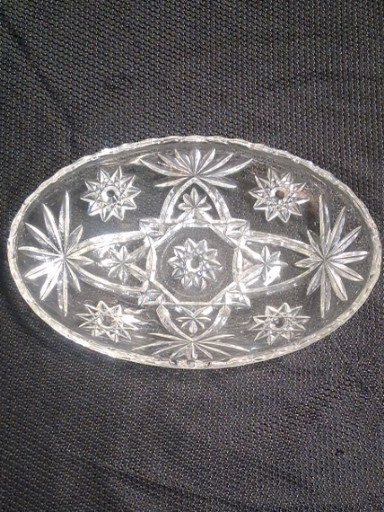 Pressed glass oval serving dish with starburst pattern by Anchor Hocking