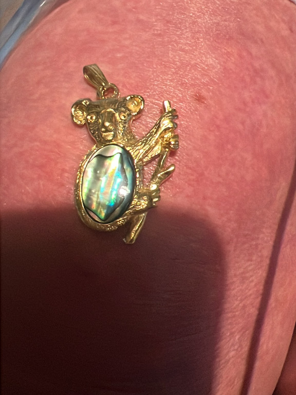 Gold-tone metal koala pendant with abalone shell inlay