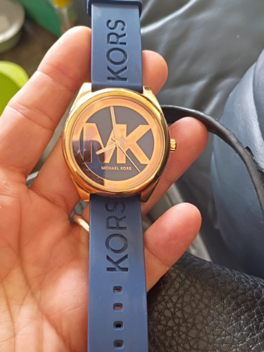 Michael Kors Janelle quartz watch with blue silicone strap and rose gold-tone case