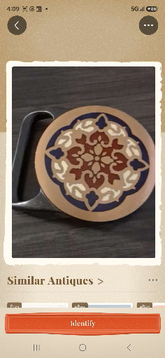 Brass belt buckle with enamel inlay titled 'Arabesque' by Tech-Ether Guild (Turner), 1978