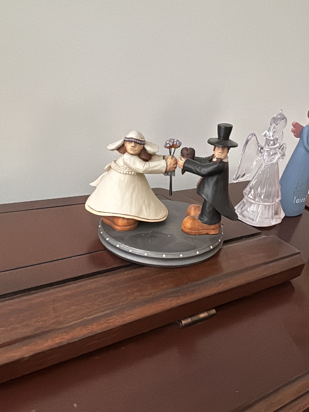 Ceramic figurine titled 'Amish Couple Dancing' by Willitts Designs