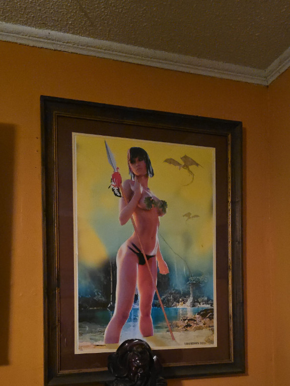 Watercolor painting of a female figure with a sword by Meril Thomison