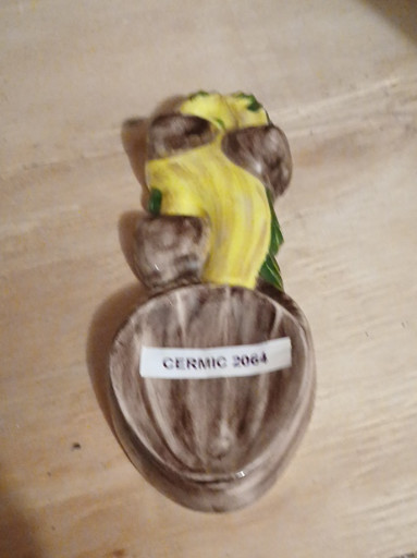 Ceramic spoon rest titled 'Merry Mushroom' by Arnel's