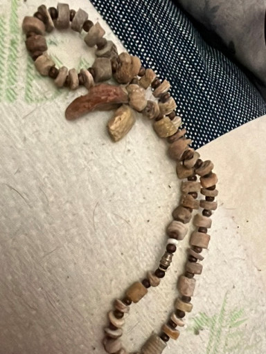 Strand of ancient stone and bone disc beads
