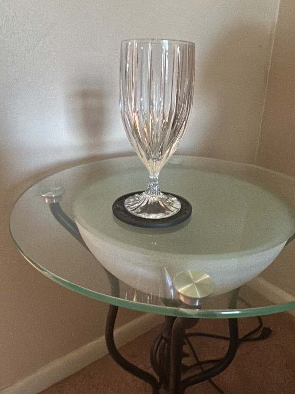 Crystal champagne flute with vertical cut pattern and decorative stem