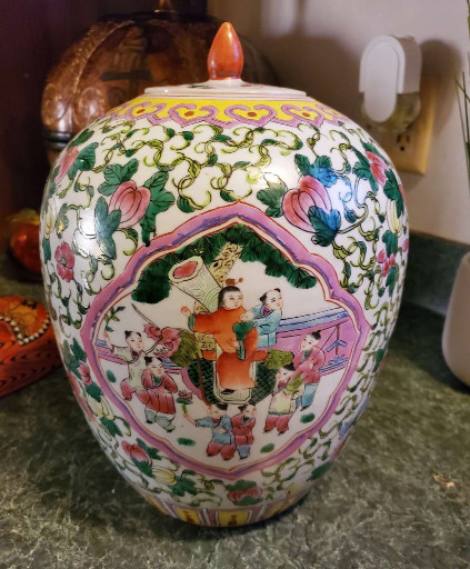 Porcelain ginger jar with lid, decorated in Famille Rose Canton style with figural scenes and floral motifs