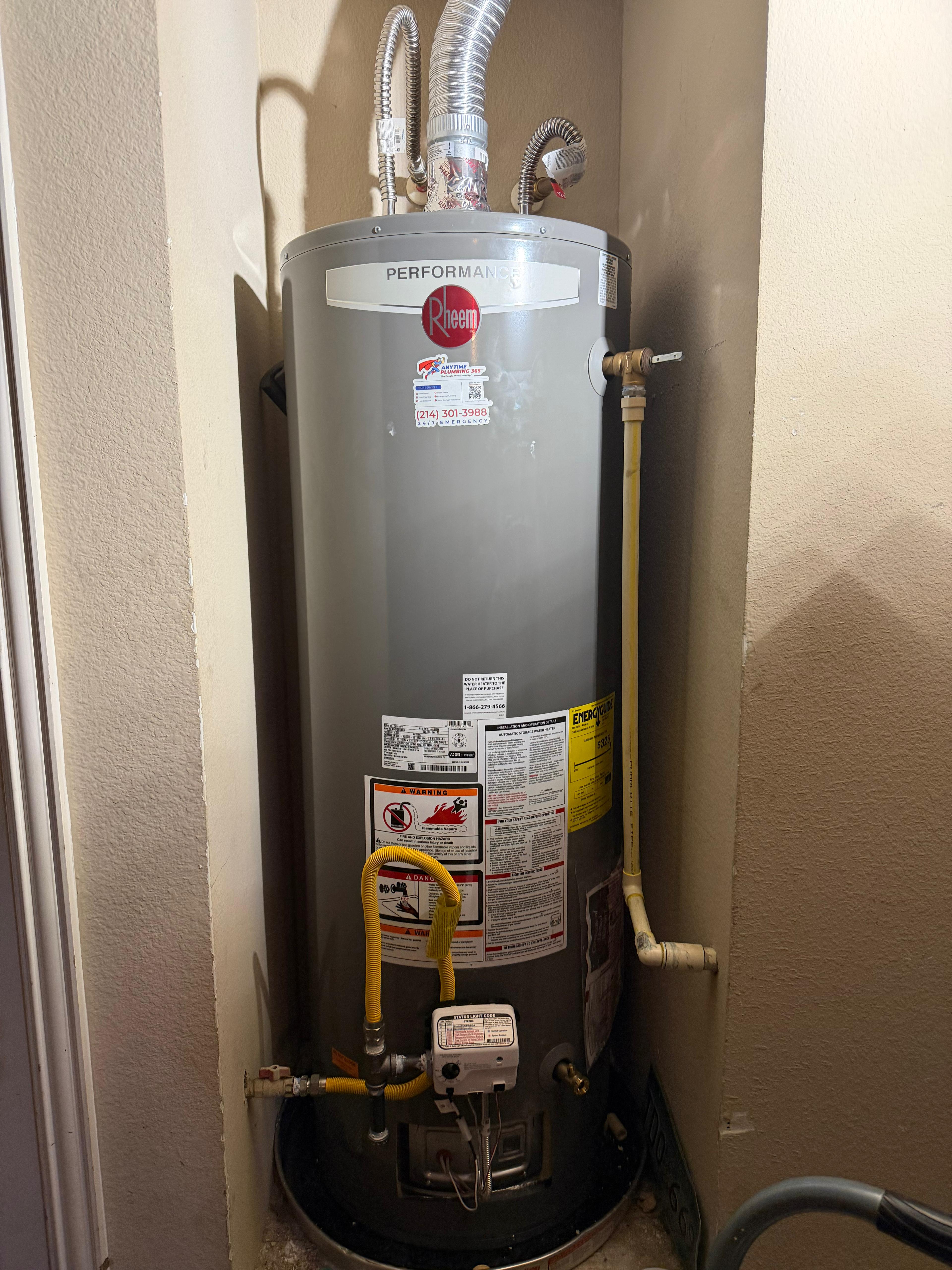 An active water heater leak has caused flooding in the garage, impacting the surrounding walls and flooring. Service is required to inspect the unit for repair or replacement, address any faulty supply connections or shutoff valves, and assess the garage walls for water damage mitigation.