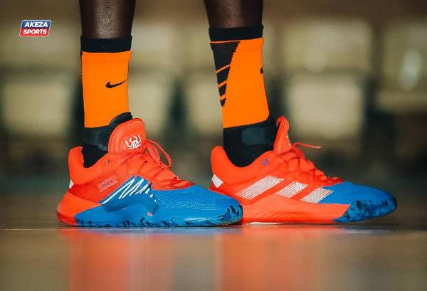Vendeur des chaussures de sport