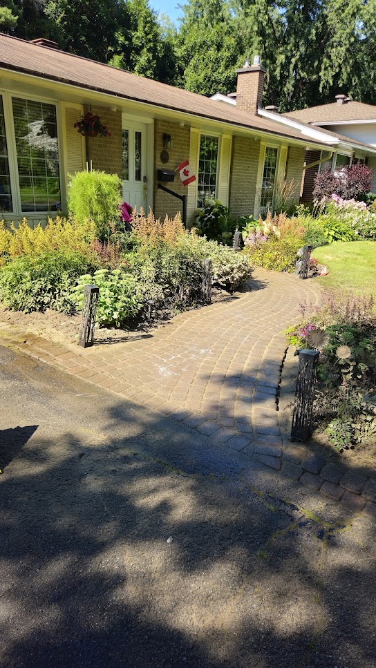A leveled driveway entrance after repair.