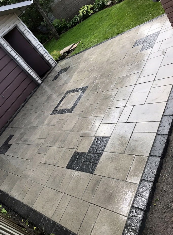 A beautifully repaired interlock patio at sunset.