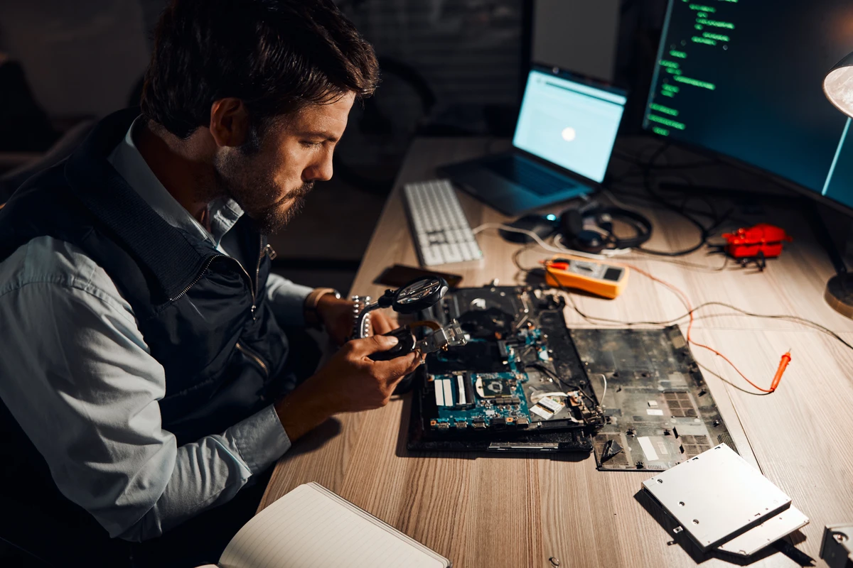 a man looking at a device