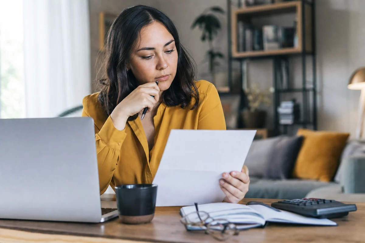 Editorial scene showing the practical decision behind does your workplace benefits review capture the full retirement match?