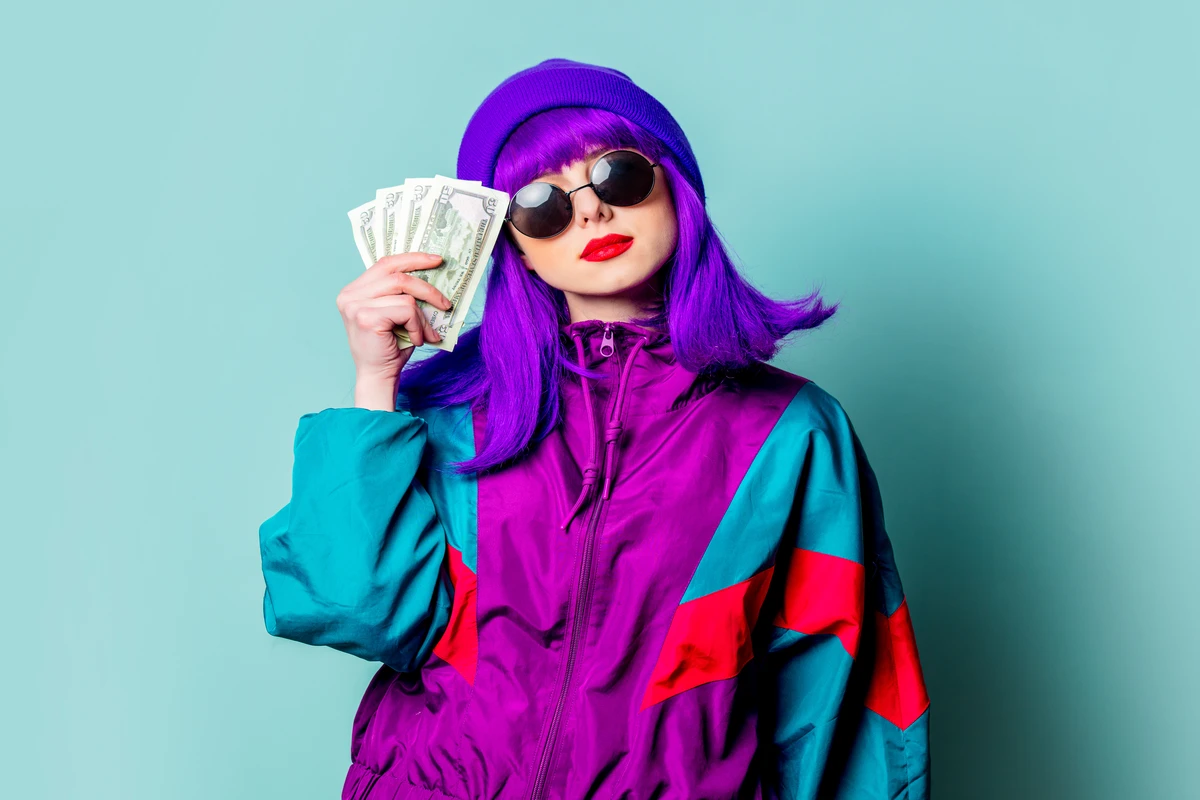 a woman with purple hair and sunglasses holding money
