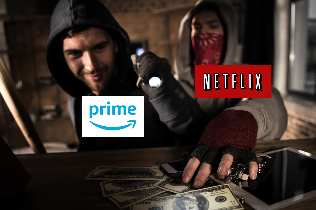 Men with flashlights and logos examining money on table