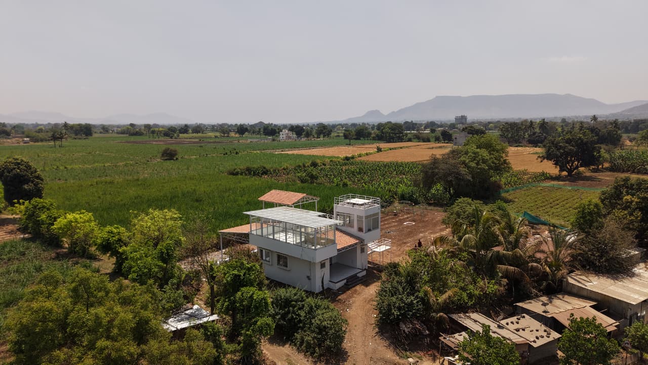 Luxury Aramzone Villa amidst lush green fields and peaceful surroundings