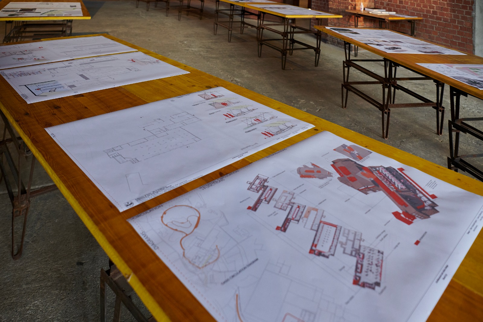 Tavole dei lavori degli studenti esposte al Munlab