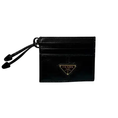 Triangle logo, soft leather card case, unused.