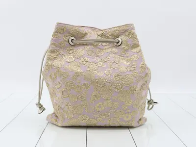 Drawstring handbag with dust bag