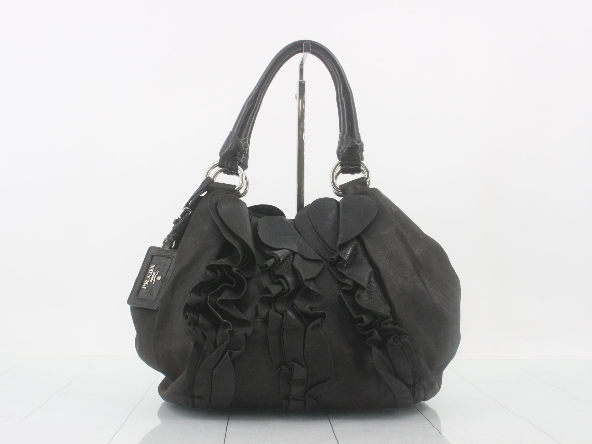 Frilled shoulder bag, leather