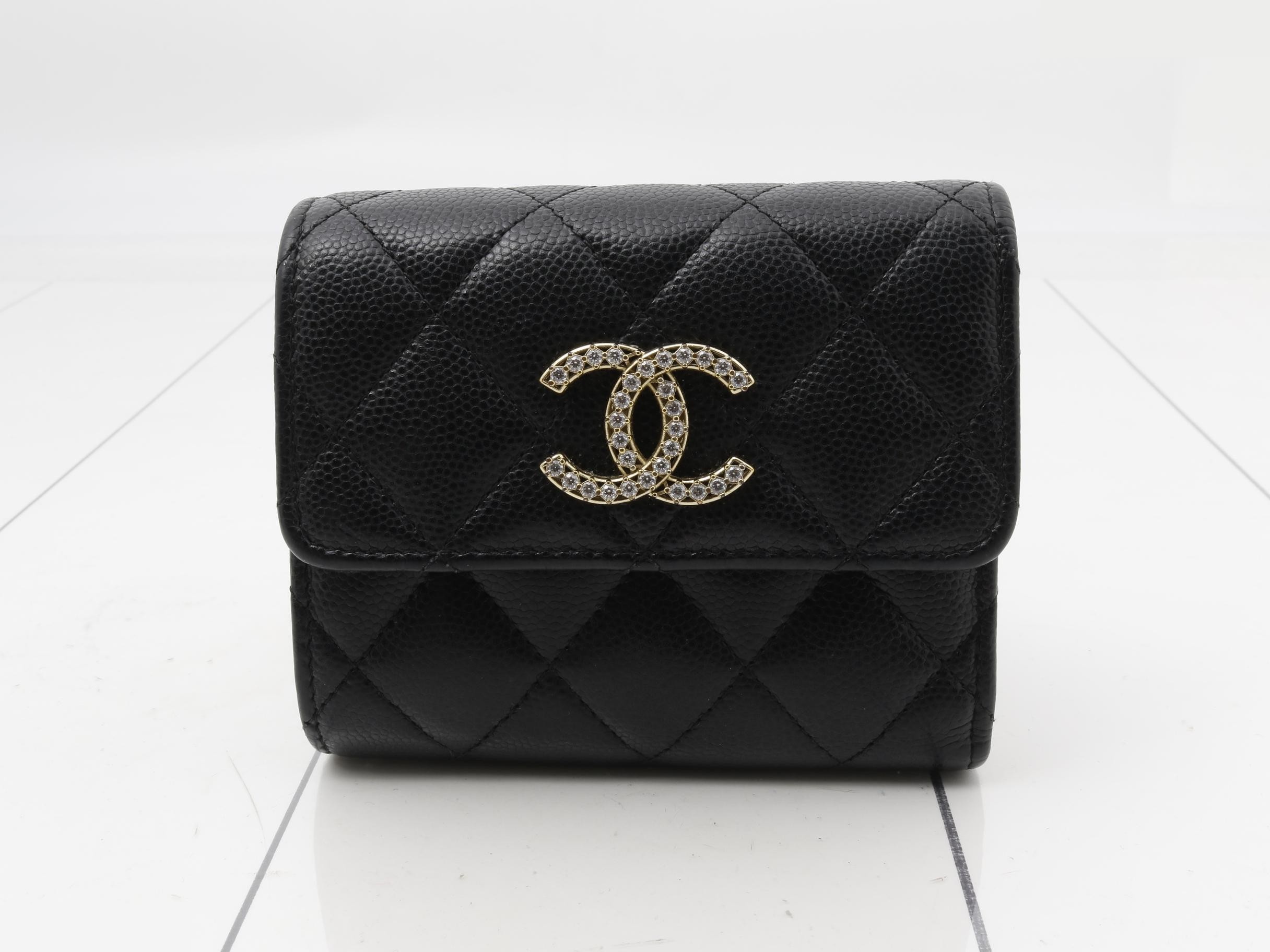 caviar leather folding wallet with Coco Mark sticker.