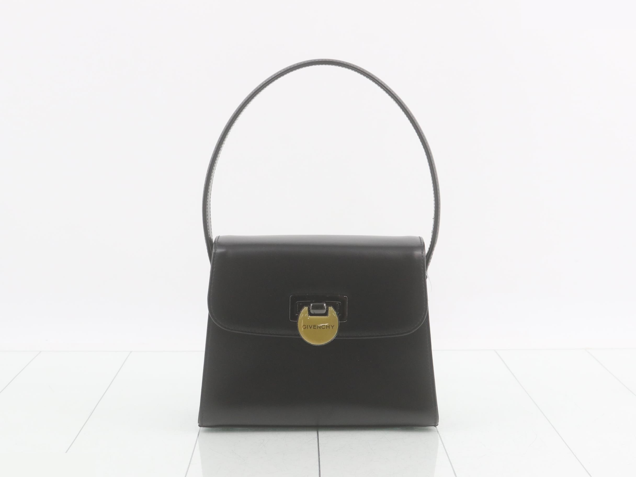 Reversible buckle leather mini handbag