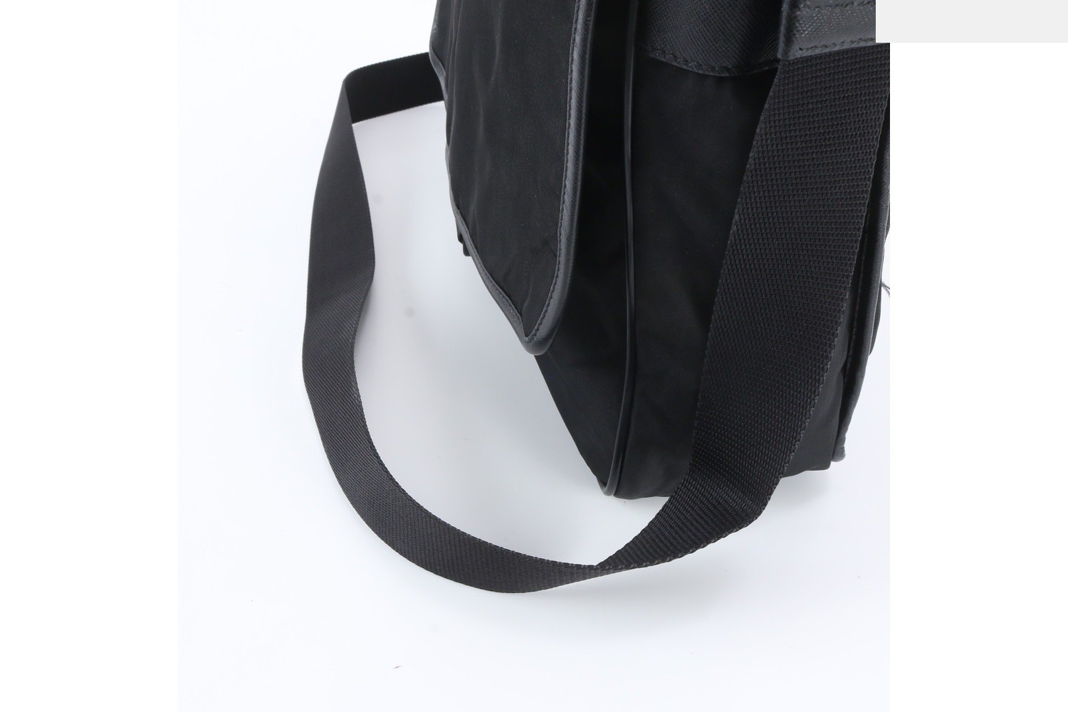 Tessuto nylon shoulder bag with white tag, triangle logo, and leather accents. — view 2