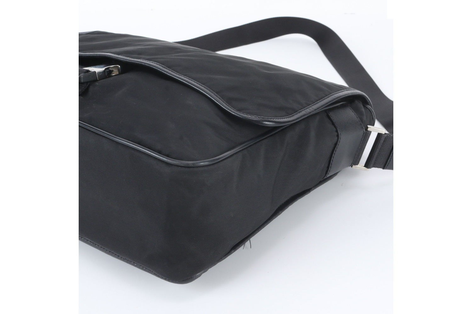 Tessuto nylon shoulder bag with white tag, triangle logo, and leather accents. — view 4
