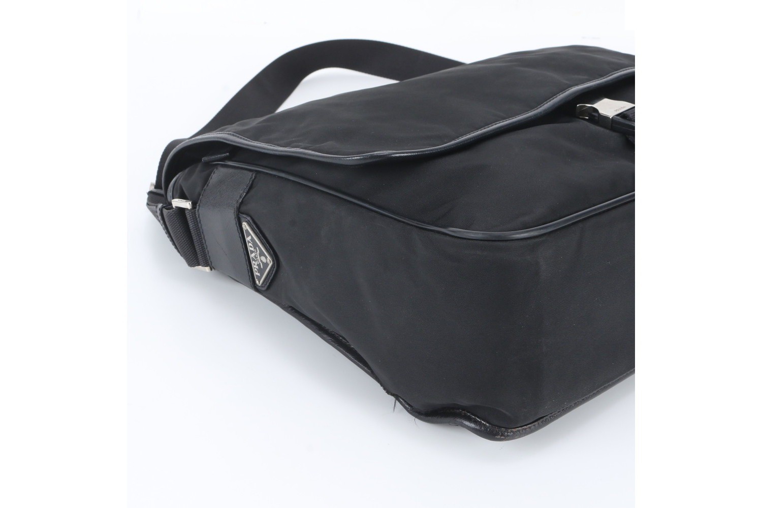 Tessuto nylon shoulder bag with white tag, triangle logo, and leather accents. — view 6