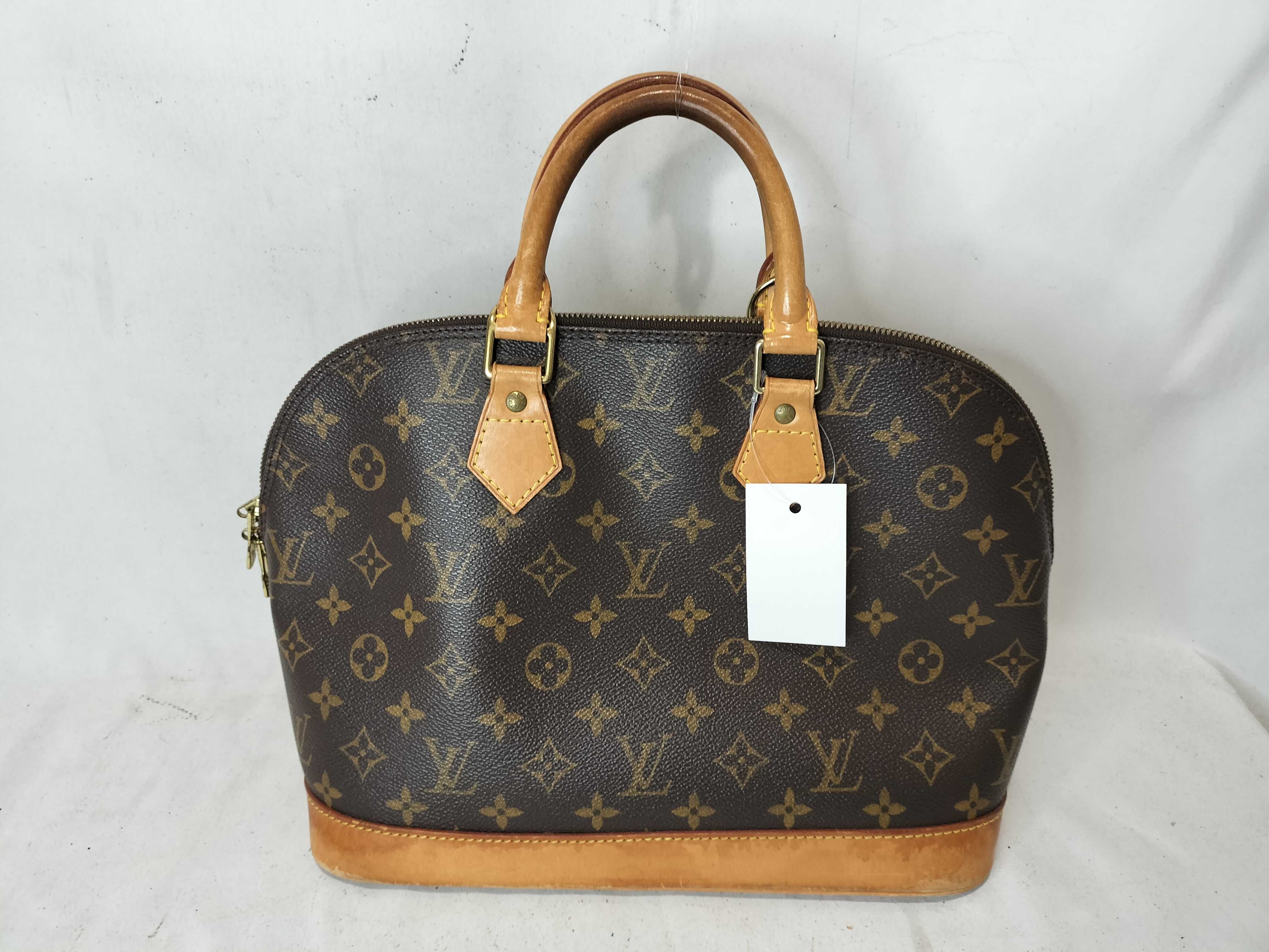 Monogram M40878 Alma MM Handbag