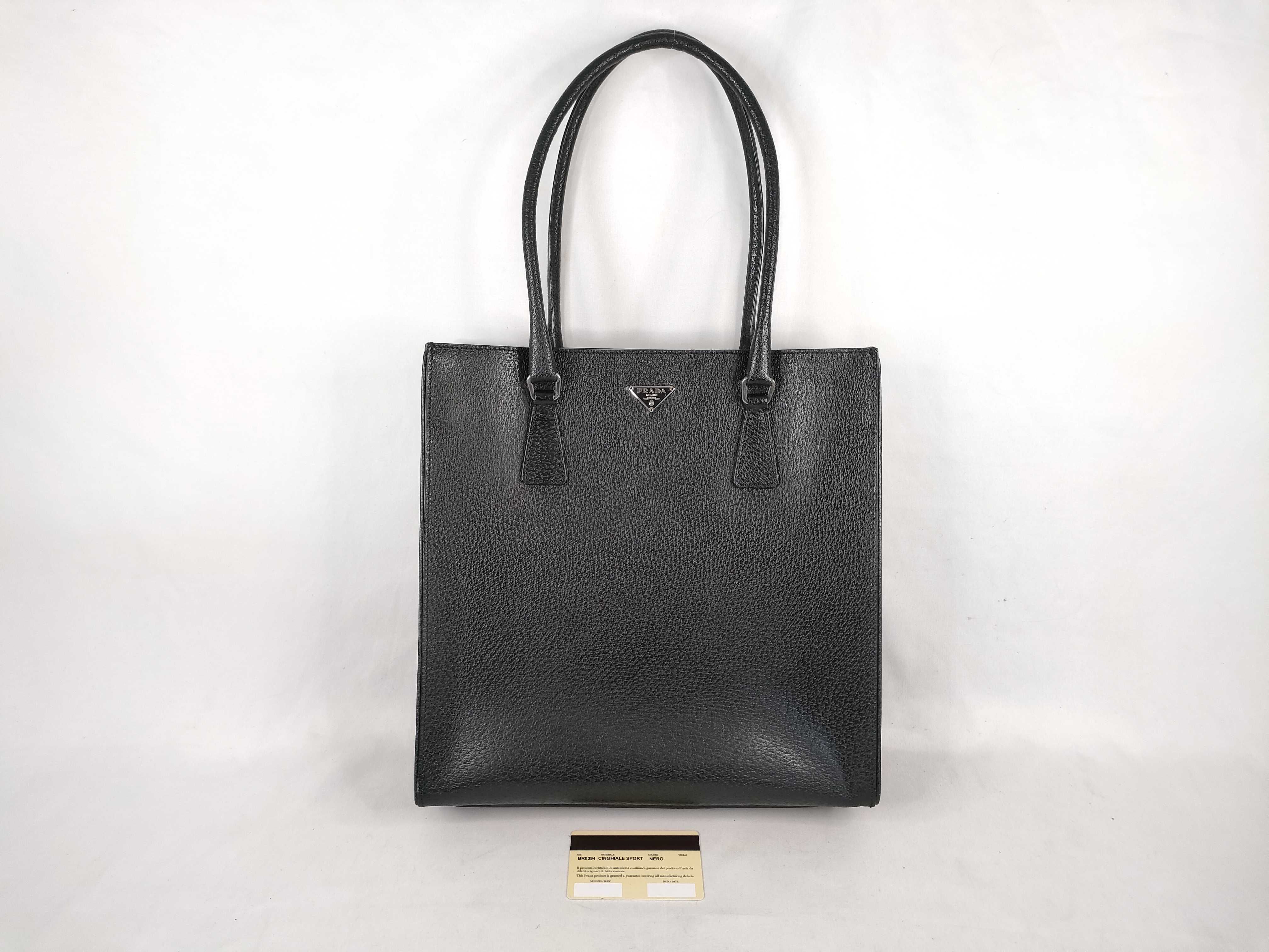 handbag, triangular logo, leather, black, card tag, handbag