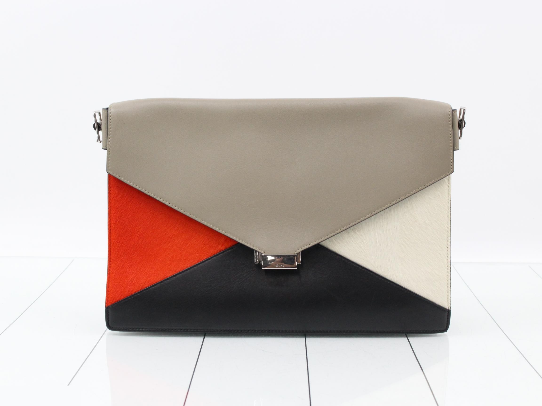 Leather and suede 2-way clutch bag