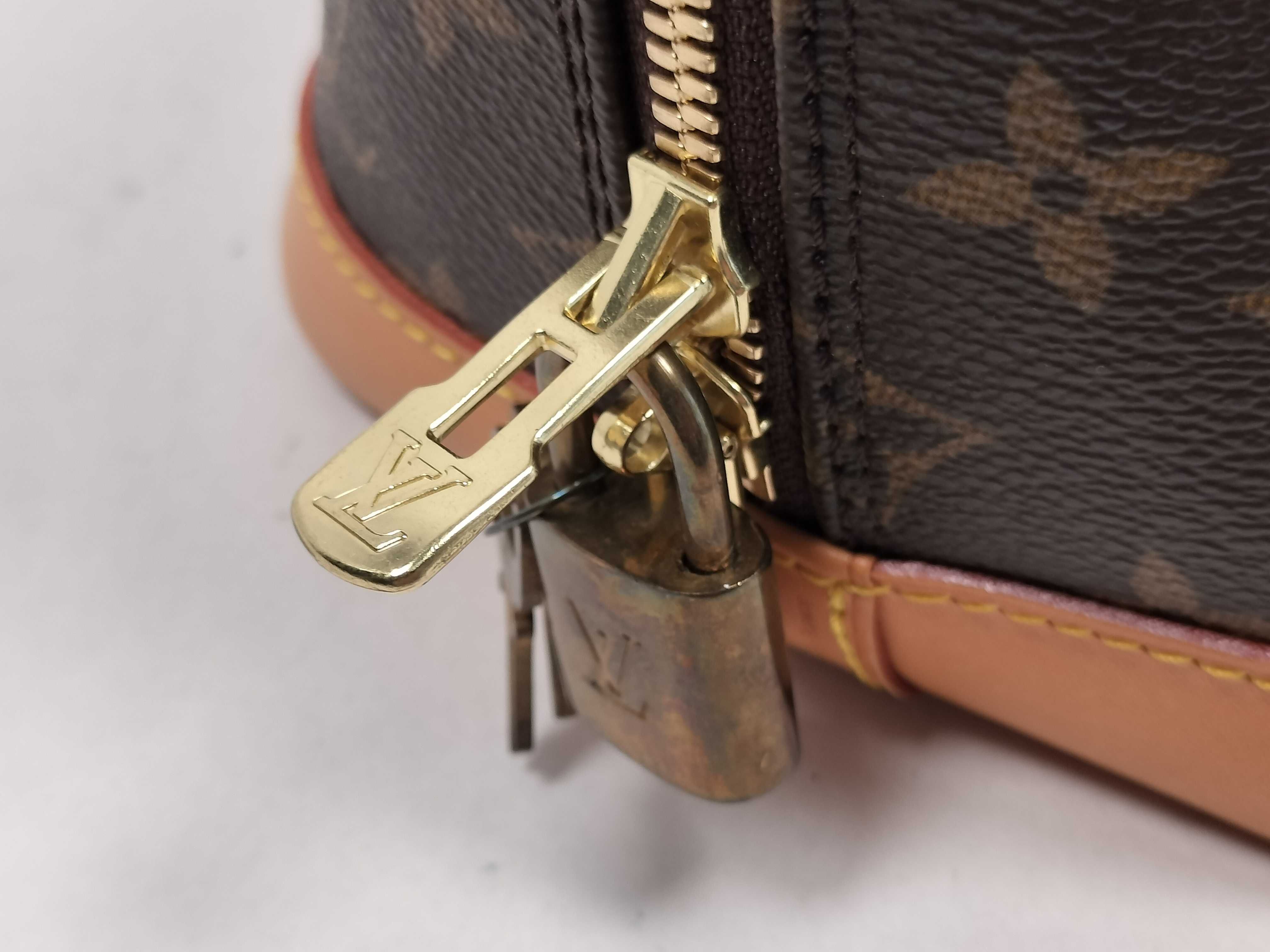 Monogram Alma M51130 Handbag — view 9