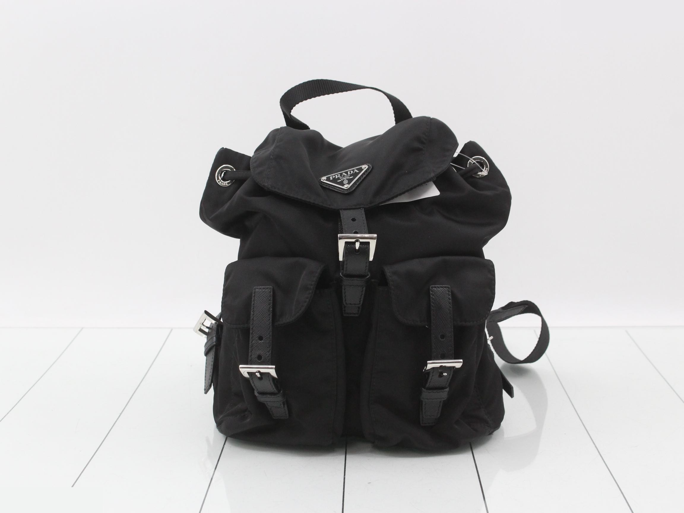 Saffiano leather backpack with triangular logo plate
