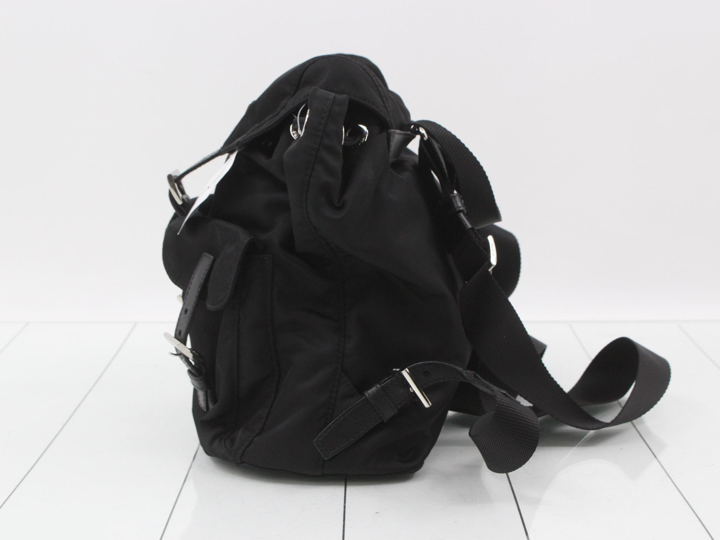 Saffiano leather backpack with triangular logo plate — view 3