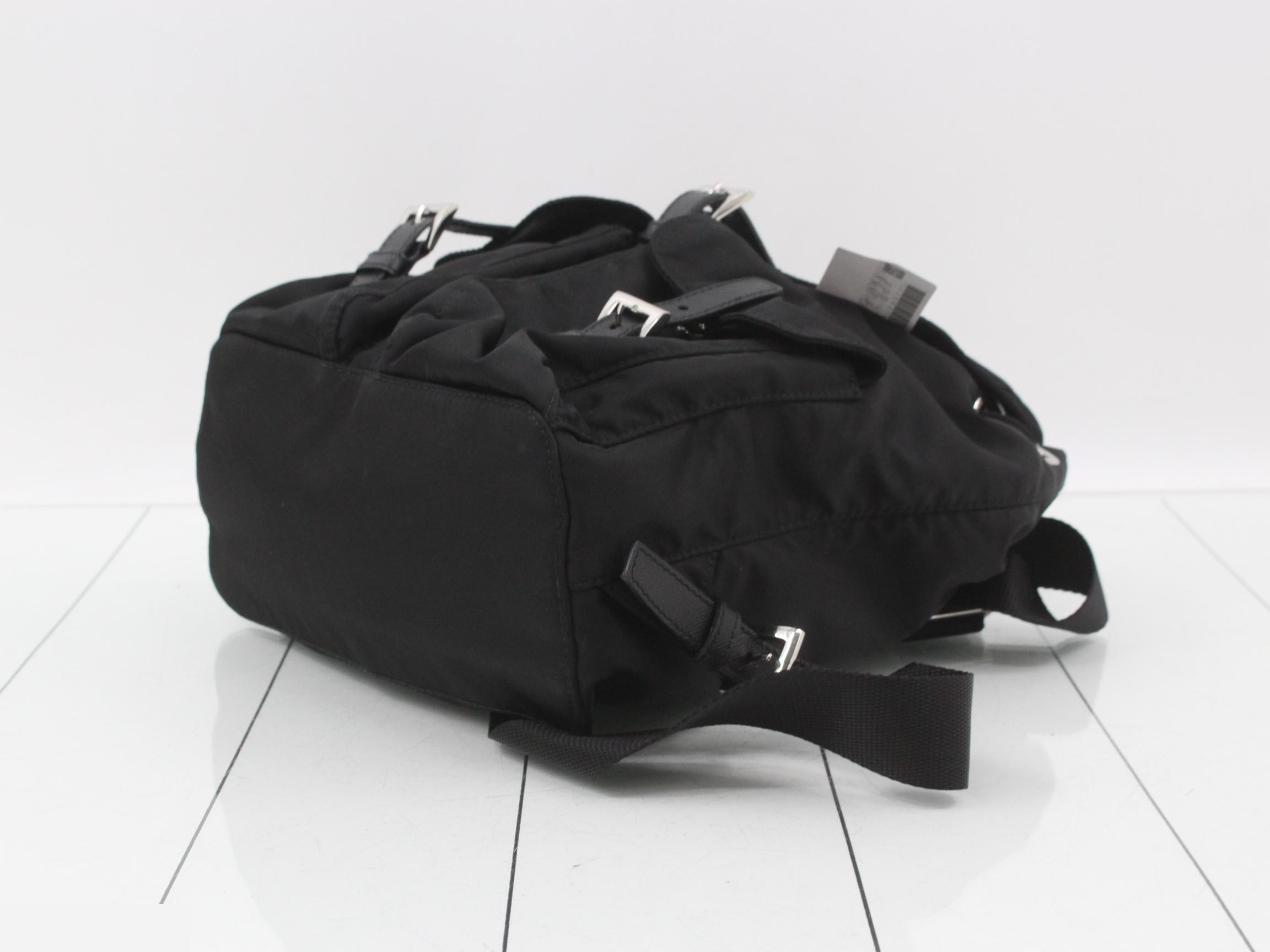 Saffiano leather backpack with triangular logo plate — view 6