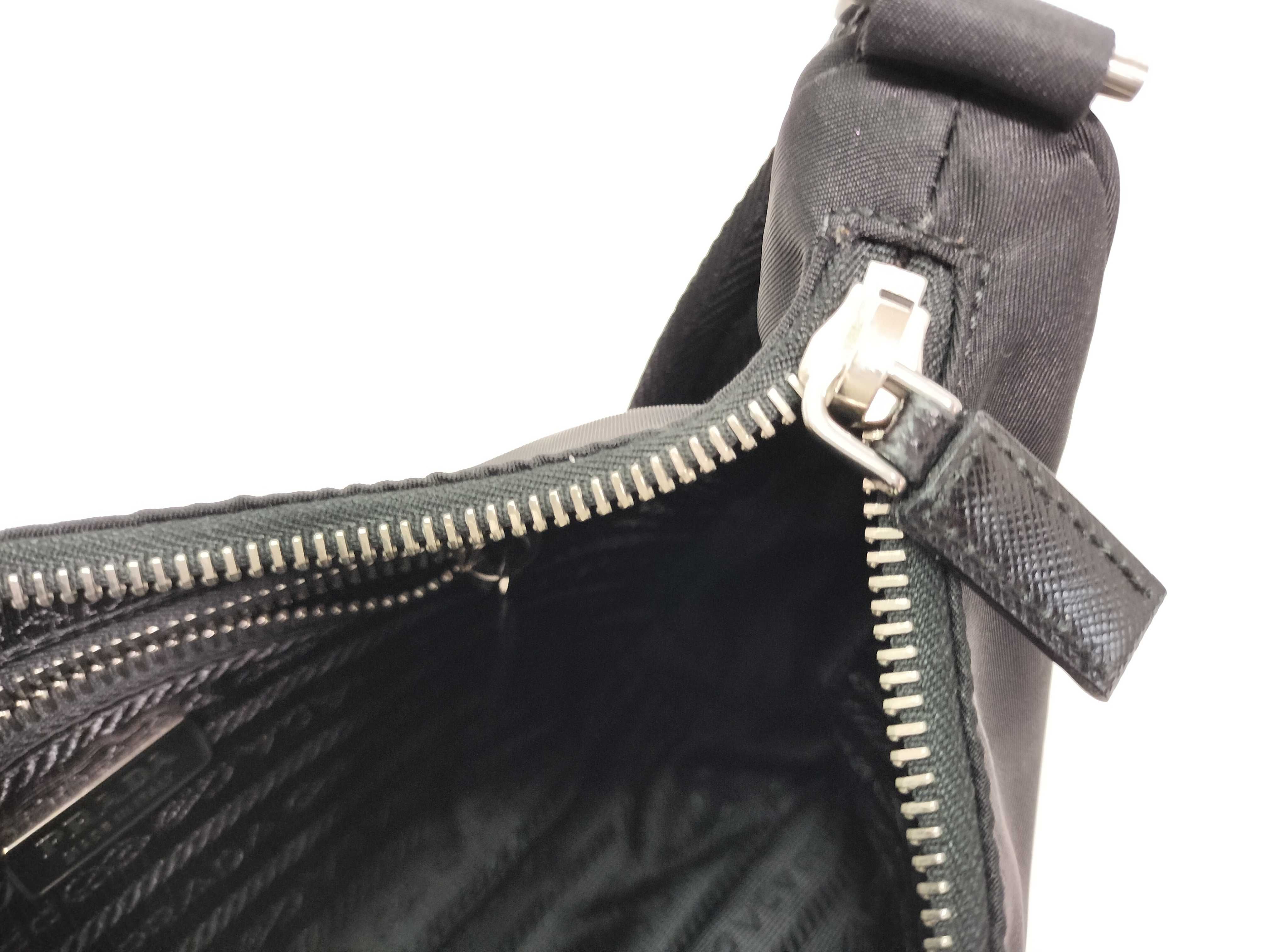 nylon mini handbag with triangular plate and guarantee card. — view 14
