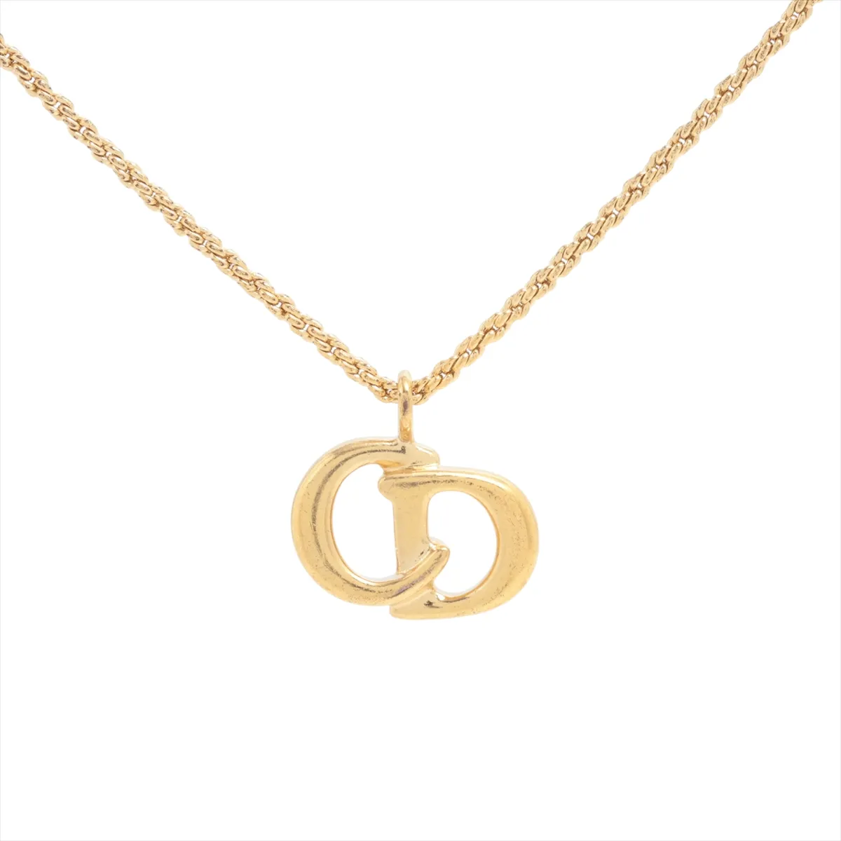 CD logo necklace, GP gold, shows signs of wear, tarnishing,