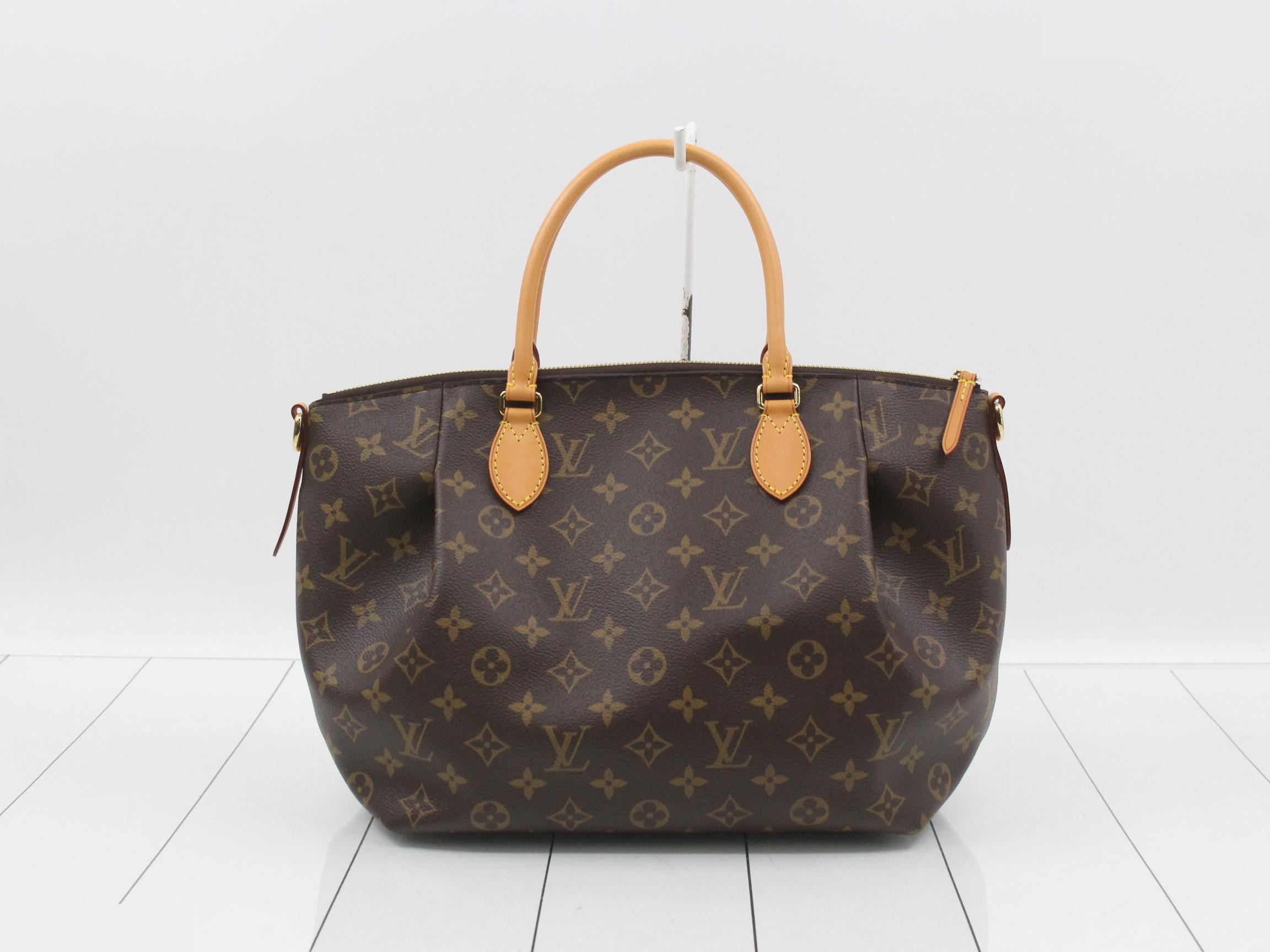 Turenne MM, unused, stored item, includes shoulder strap, dust bag, and shopping bag. — view 2