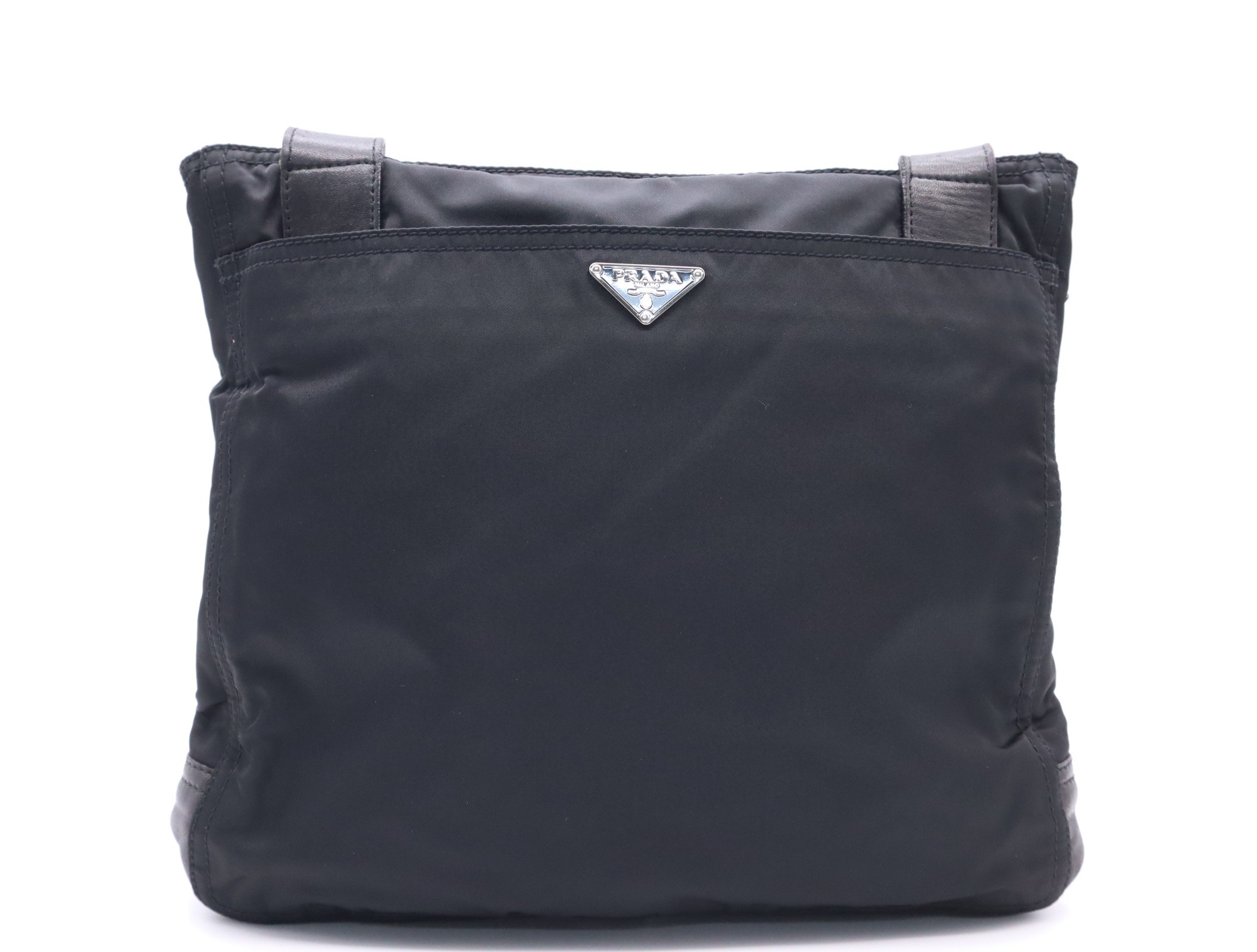 Nylon shoulder bag with triangular logo, black, silver hardware, and card included. — view 2