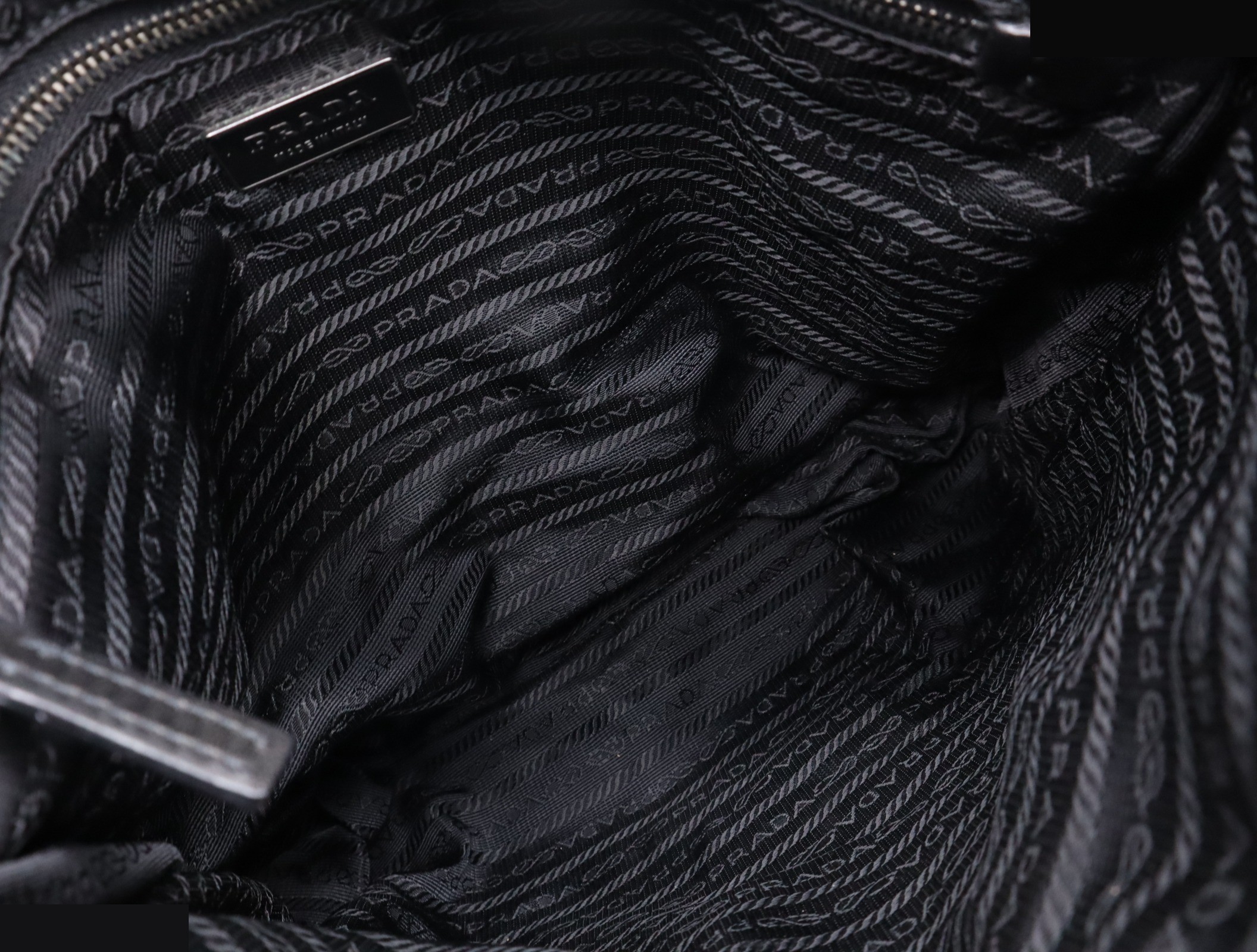 Nylon shoulder bag with triangular logo, black, silver hardware, and card included. — view 7