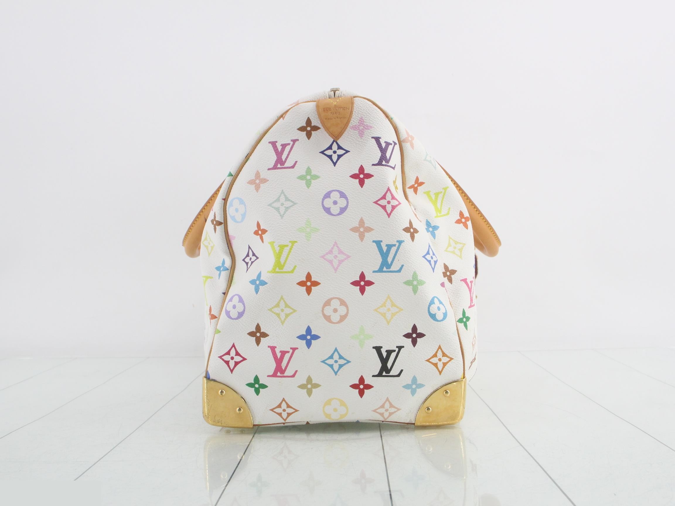 Keepall 45 Blanc, includes 2 keys, clochette, name tag, and handle strap. — view 4