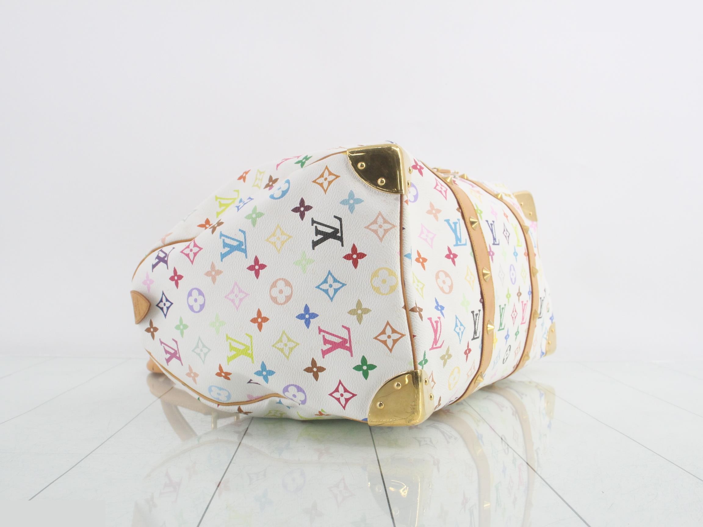 Keepall 45 Blanc, includes 2 keys, clochette, name tag, and handle strap. — view 5