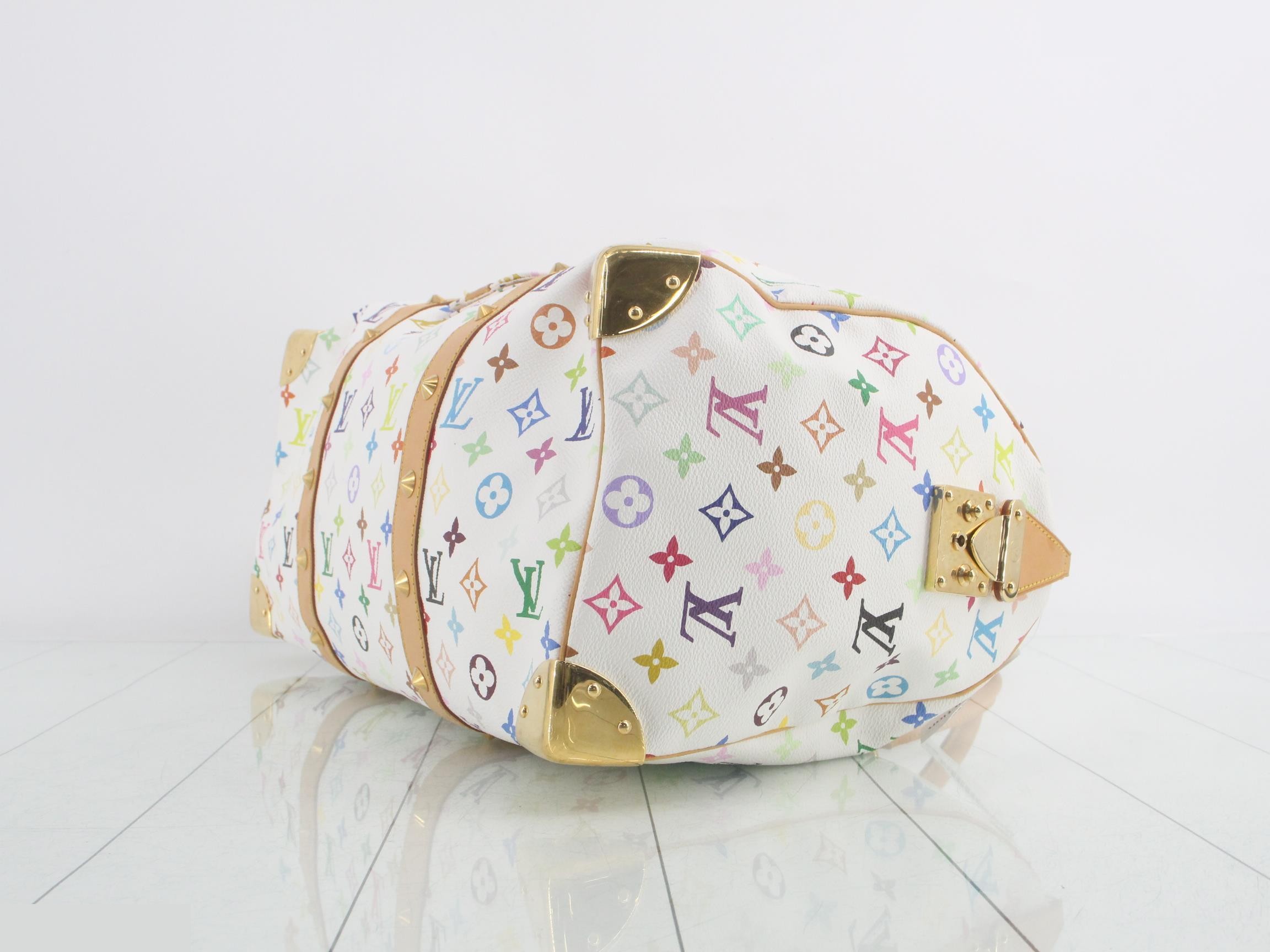 Keepall 45 Blanc, includes 2 keys, clochette, name tag, and handle strap. — view 6