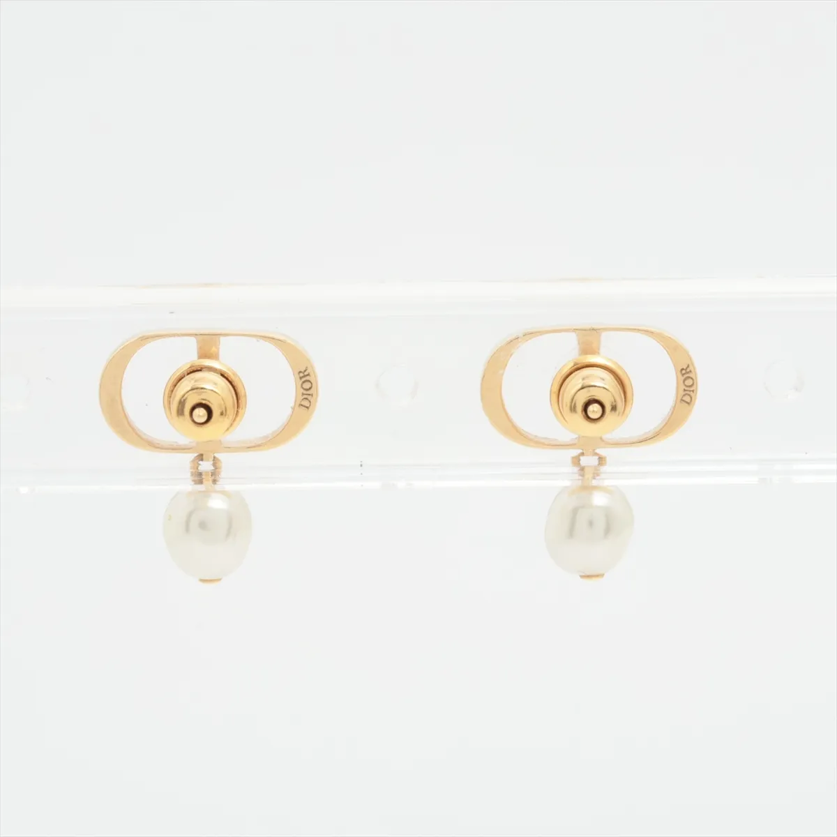 Petit CD earrings (for both ears), gold-plated with faux pearls. Shows signs of wear including — view 2