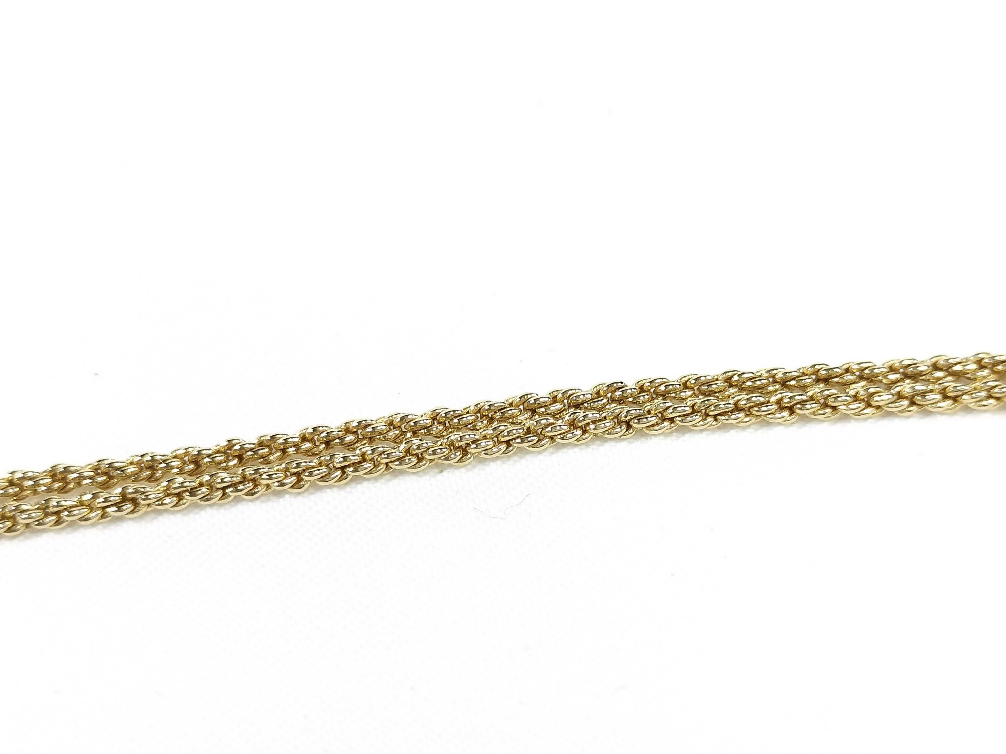 gold-colored necklace and other accessories — view 7