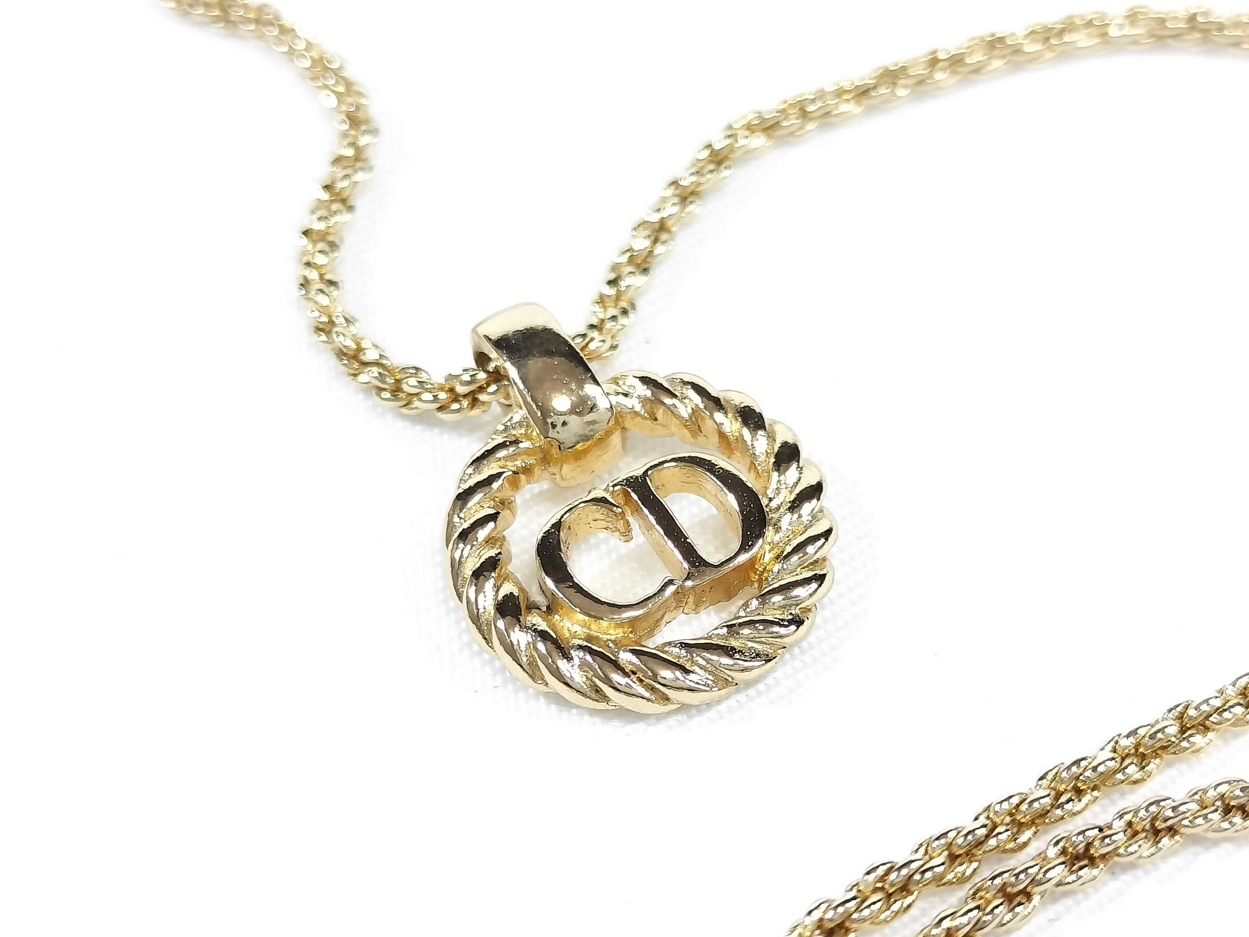 gold-colored necklace and other accessories — view 10