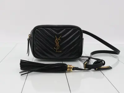 V-stitch waist bag with fringe, black