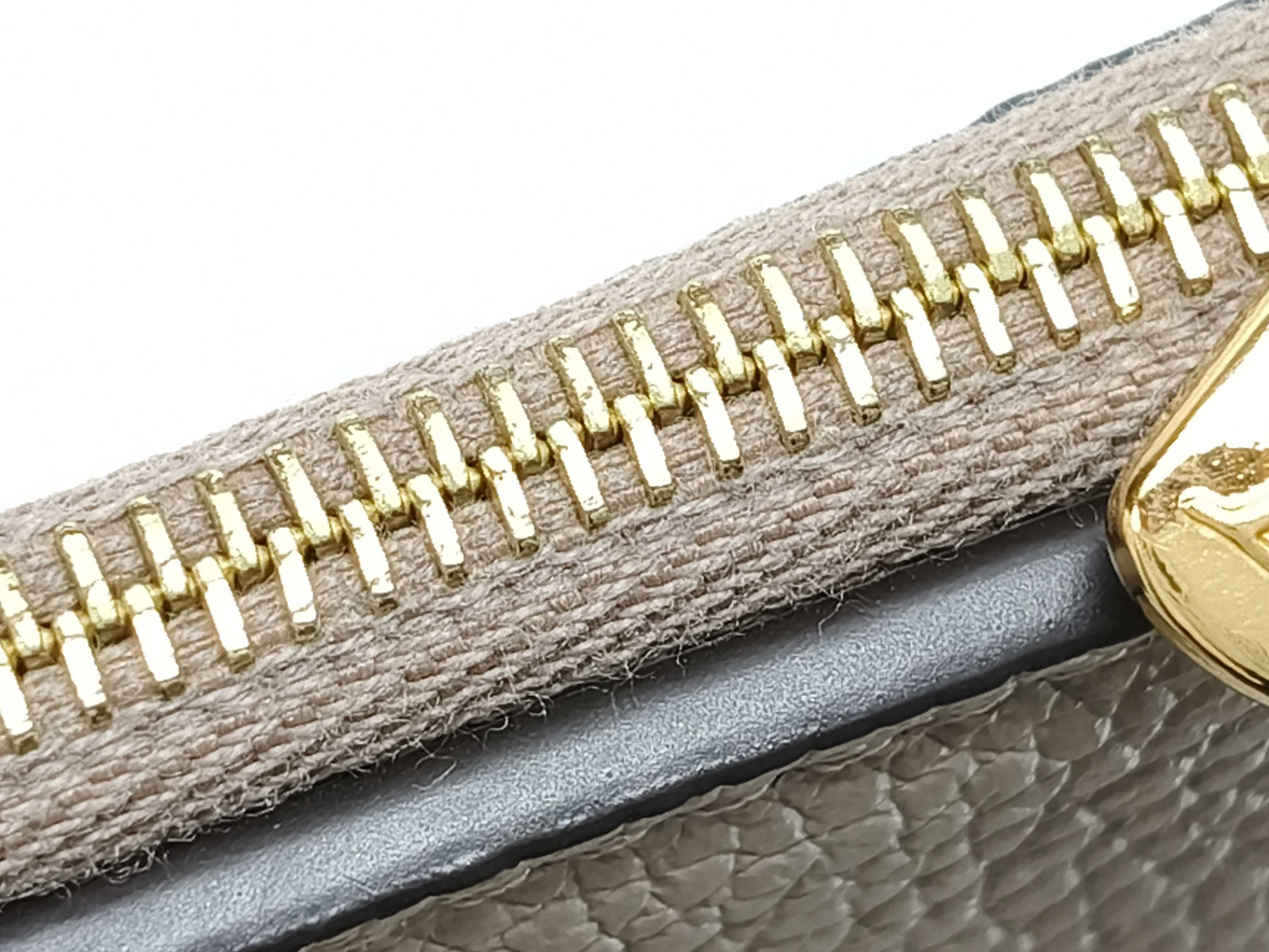 Monogram Empreinte Portefeuille Zoé Tourterelle Calfskin Wallet M69800 — view 9