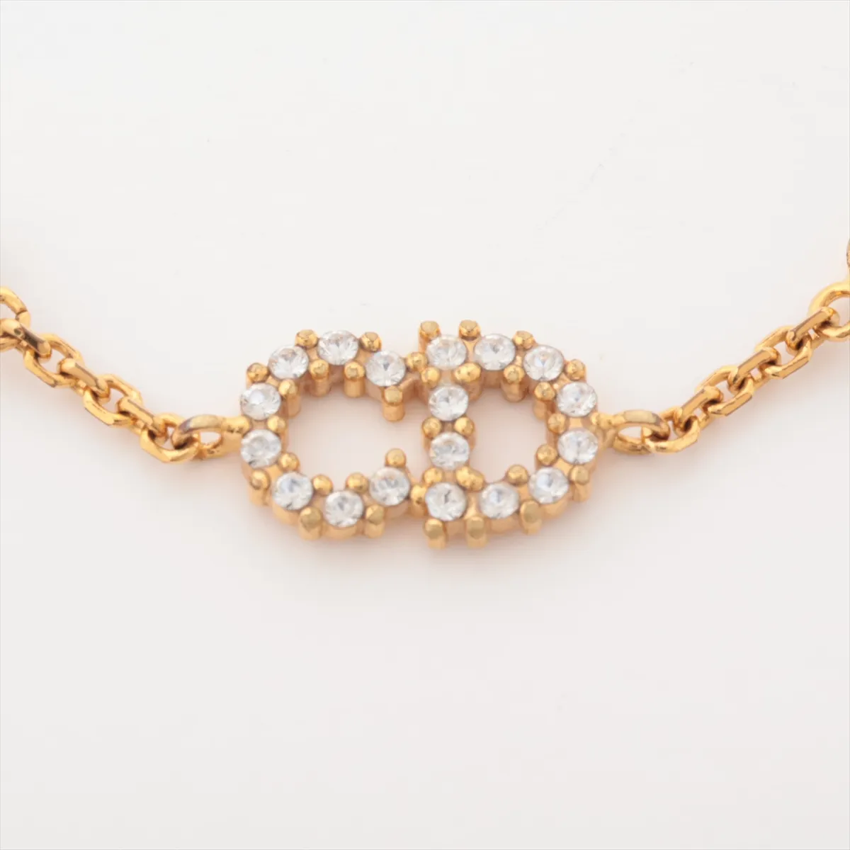 Clair D Lune bracelet, gold-plated with rhinestones and faux pearls. Shows signs of wear including dents, chips, — view 2